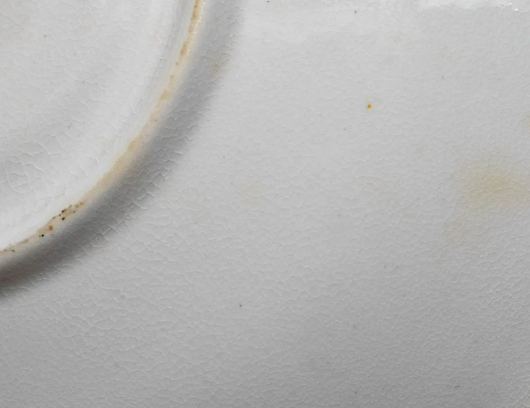 No cracks, no chips, no flea bites. But there is crazing, which is why the saucer doesn't ring. Note the yellow patch — the crazing is no longer pristine; a 