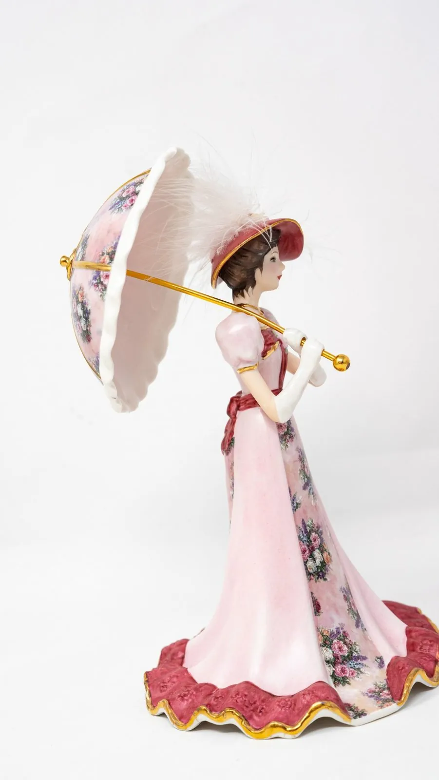 The porcelain parasol rings softly.